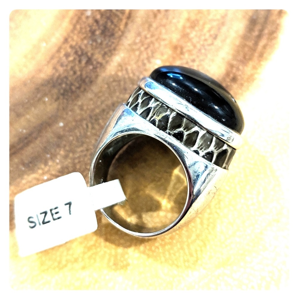 Silver ring with black stone